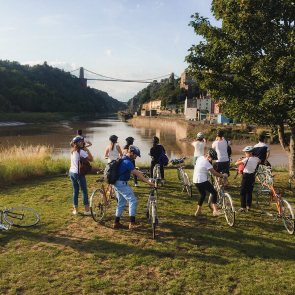 A tour group with Cycle the City, stopping at the Clifton Suspension Bridge. 